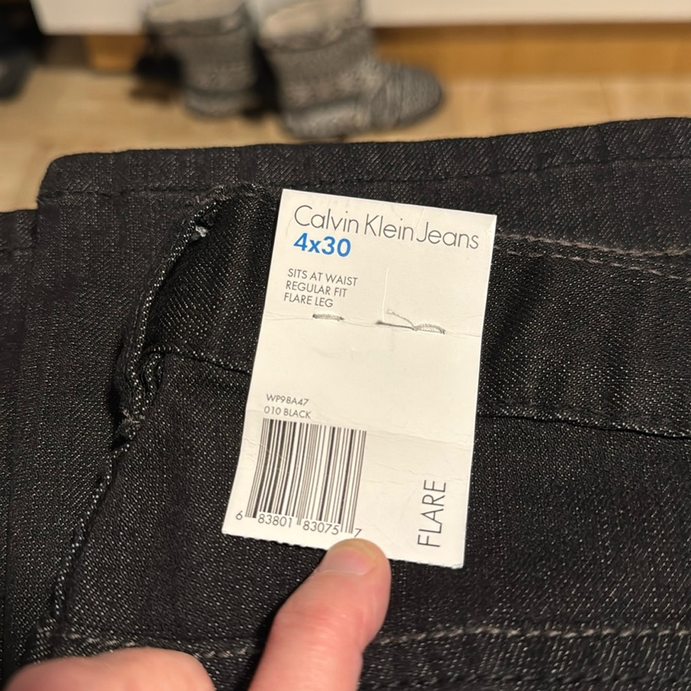 Black Denim Calvin Klein Flare Leg Jeans.  27 x 30, size 4, never worn